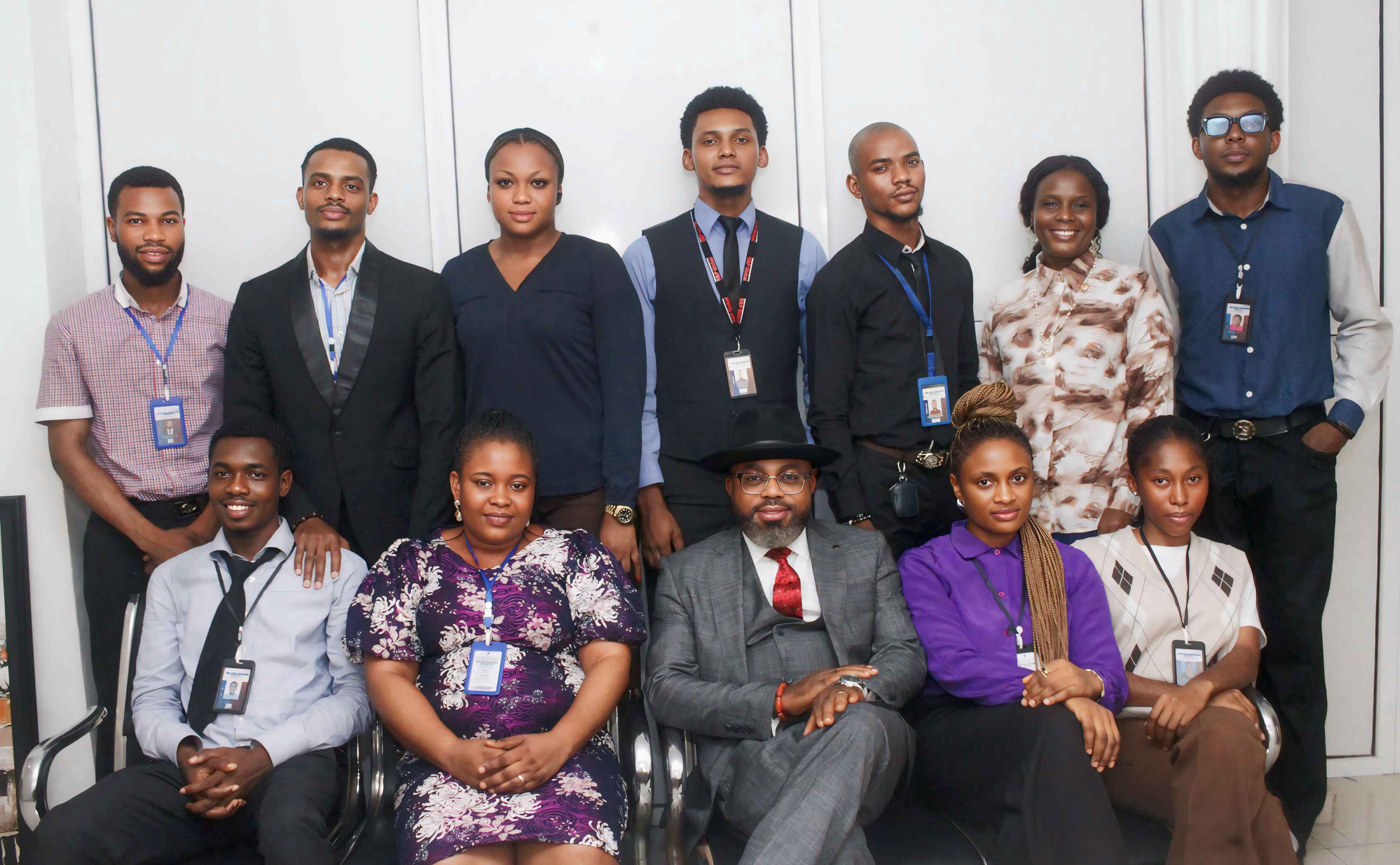 Members of the Ofure Global International Services team gathered in an office